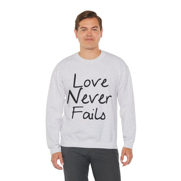 Love Never Fails Unisex Heavy Blend™ Crewneck Sweatshirt