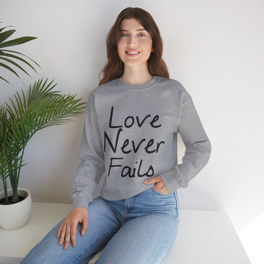 Love Never Fails Unisex Heavy Blend™ Crewneck Sweatshirt